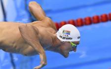 South Africa's Cameron van der Burgh dives in. Picture: AFP