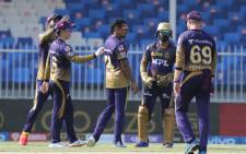 Kolkata Knight Riders players celebrate the fall of a wicket during their Indian Premier League match against the Delhi Capitals on 28 September 2021. Picture: @IPL/Twitter