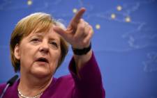 FILE: Germany's Chancellor Angela Merkel gestures as she addresses media representatives after a European Union (EU) summit at EU Commission Headquarters in Brussels on 28 May 2019. Picture: AFP.