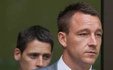 Chelsea's John Terry was banned for four matches and fined £220,000 for racially abusing Queens Park Rangers defender Anton Ferdinand in 2011. Picture: AFP