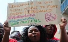 Wits University students sing and dance during a third day of protests on campus over proposed tuition fee increases on 16 October 2015. Picture: Reinart Toerien/EWN.