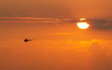Helicopter at sunset. Picture: Freeimages.  
