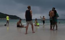 FILE: Partygoers on Haad Rin beach the morning after a Full Moon Party on the southern island of Ko Phangan, Thailand. Picture: AFP