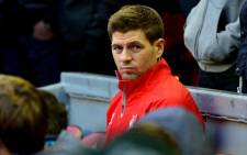 Liverpool's English midfielder Steven Gerrard takes his seat on the bench ahead of the English Premier League football match between Liverpool and Stoke City at Anfield in Liverpool, north west England on 29 November, 2014. Picture: AFP
