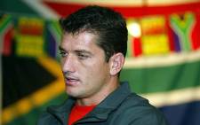 FILE: Former Springboks scrumhalf Joost van der Westhuizen talks to the media during a press conference for the Rugby World Cup in Perth, 15 October 2003.   Picture: AFP