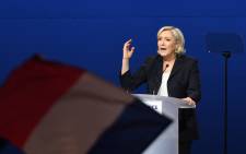 French presidential election candidate for the far-right Front National party Marine Le Pen gestures as she delivers a speech during a meeting at the Parc des Expositions in Villepinte, on 1 May, 2017. Picture: AFP.