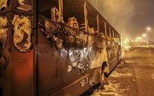 At least two buses were torched during overnight protests in Mabopane north of Pretoria on 21 June 2016 when looters went on the rampage. Picture: Reinart Toerien/EWN