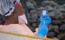 FILE: A nurse prepares a vaccine against Ebola in Goma, in the Democratic Republic of Congo on 7 August 2019. Picture: AFP