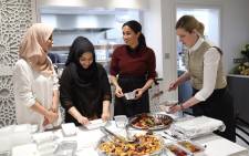 The Duchess of Sussex, Meghna Markle, introduces friend and Michelin starred chef Clare Smyth to the women of the Hubb Community Kitchen as they prepare 300 meals for the local community to be delivered to care homes, homeless shelters and women’s refuges. Picture: @KensingtonRoyal/Twitter