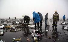 A handout picture released by Russia's Emergencies Ministry shows Russian rescuers working at the crash site of a passenger plane in Rostov-on-Don on 19 March 2016. Picture: STR/Russian Emergencies Ministry/AFP.