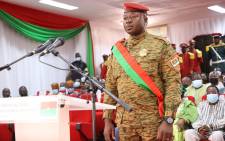 In this handout picture released on 16 February 2022 from the Burkina Faso Presidential Office, Burkina Faso strongman Lieutenant-Colonel Paul-Henri Sandaogo Damiba stands during the swearing-in ceremony as the country's new President in Ouagadougou. Picture: Burkina Faso Presidential Office/AFP