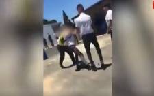This screenshot was taken from a video of pupils at Hoërskool President in Ridgeway fighting. Four students have been suspended.