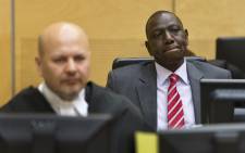 This file photo taken on 10 September, 2013 shows Kenya's Deputy President William Ruto reacting as he sits in the courtroom before the trial at the International Criminal Court (ICC) in The Hague. Picture: AFP.