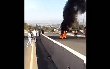 eSwatini has seen a spate of pro-democracy protests, with demonstrators blocking roads in Manzini. Picture: @SwaziNews/Twitter.