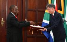 President Cyril Ramaphosa receives a Letter of Credence from the Ambassador of Israel, Eliav Belotsercovsky, on the occasion of the Credentials Ceremony at the Sefako Makgatho Presidential Guesthouse in Tshwane on 25 January 2022. Picture: @PresidencyZA/Twitter