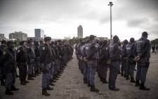 FILE: SAPS officers line the Grand Parade in Cape Town before an operation in the CBD. Picture: Thomas Holder/Eyewitness News.