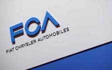 FILE: A FCA (Fiat Chrysler Automobiles) logo is displayed on 6 March 2019 during a press day ahead of the Geneva International Motor Show in Geneva. Picture: AFP