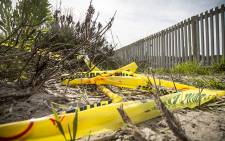 Police tape at a cordoned off area in Lavender Hill, where a body necklaced, was found. Picture: Thomas Holder/EWN