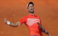 Novak Djokovic celebrates reaching Madrid Open final after beating Dominic Thiem on 11 May. Picture: @MutuaMadridOpen/Twitter.