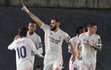 Real Madrid forward Karim Benzema celebrates after scoring during the UEFA Champions League semifinal first leg football match between Real Madrid and Chelsea at the Alfredo di Stefano stadium in Valdebebas, on the outskirts of Madrid, on 27 April 2021. Picture: Javier Soriano/AFP