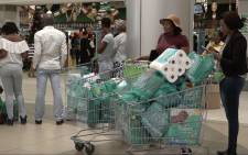 Consumers flooded to various stores for the Black Friday specials. Picture: Louise McAuliffe/EWN