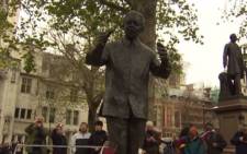 A statue of Nelson Mandela stands outside the South African High Commission in London where Thousands of South African expats are registered to vote. Picture: CNN.