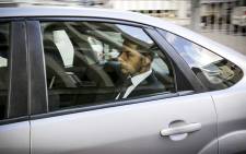 Shrien Dewani leaves court in a silver Ford Focus after another day in court. 