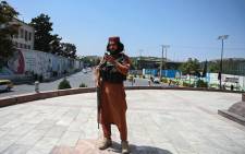A Taliban fighter stands guard at the Massoud Square in Kabul on August 16, 2021. Picture: Wakil Kohsar / AFP
