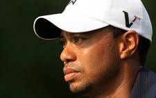 Tiger Woods looks on from the fifth hole during the first round of The Players Championship at TPC Sawgrass on May 12, 2011. Picture: AFP