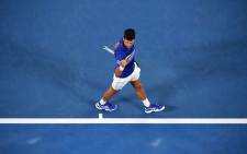 Novak Djokovic reacts after winning his seventh Australian Open title. Picture: @AustralianOpen/Twitter.