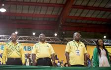 President Jacob Zuma, Cyril Ramaphosa, Zweli Mkhize and Baleka Mbete sing the national anthem at the ANC's 54th national conference. Picture: Thomas Holder/EWN. 