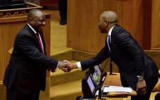 President Cyril Ramaphosa shares a light moment with DA Leader Musi Maimane in the National Assembly in Parliament, Cape Town. Picture: GCIS.