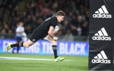 FILE: New Zealand's Beauden Barrett goes over for a try against Australia in their Rugby Championship match in Auckland, New Zealand on 25 August 2018. Picture: @AllBlacks/Twitter