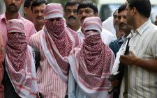 Indian police said the three men belonged to the Indian Mujahideen, which has claimed responsibility for serial blasts in several cities including attacks in New Delhi on 13 September 2008. Picture: Prakash Singh/AFP

