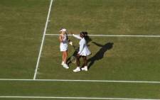 Serena Williams congratulates Angelique Kerber following their Wimbledon final match. Picture: @Wimbledon/Twitter.