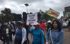 Zimbabweans protest against the continued leadership of Robert Mugabe on 18 November 2017 following a military takeover. Picture: EWN