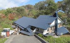 A house damaged by a landslide caused by an earthquake is seen in Atsuma town in Hokkaido prefecture on 6 September, 2018. Picture: AFP.