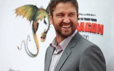 Cast member Gerard Butler arrives for the premiere of DreamWorks' How To Train Your Dragon at the Gibson Amphitheater on March 21, 2010. Picture: AFP.