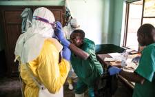 Health workers wear protective equipment as they prepare to attend to suspected Ebola patients at Bikoro Hospital, the epicentre of the latest Ebola outbreak in the Democratic Republic of Congo. Picture: AFP