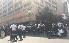 Emergency services workers gathering outside the Luthuli House in Johannesburg. Picture: Masego Rahlaga/EWN