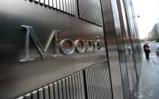 FILE: A sign for Moody's rating agency stands in front of the company headquarters in New York in 2012. Picture: AFP/Emmanuel Dunand.