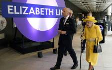 The 96-year-old monarch smiled as she visited Paddington Station in London to see the new Elizabeth line. Picture: Andrew Matthews / POOL / AFP.