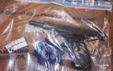 A gun seized by police following an attempted hijacking in Douglasdale, Johannesburg. Picture: @AsktheChiefJMPD/Twitter.