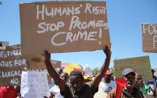 Lenasia residents demonstrate against houses built illegally in the area. Picture: Taurai Maduna/EWN.
