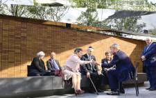 King Willem-Alexander (R) talks with survivors of the Second World War after the unveiling of the Holocaust Memorial of Names in Amsterdam, on September 19, 2021. Picture: AFP.