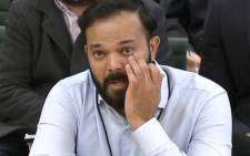 A video grab from footage broadcast by the UK Parliament's Parliamentary Recording Unit (PRU) shows former Yorkshire cricketer Azeem Rafiq fighting back tears while testifying in front of a Digital, Culture, Media and Sport (DCMS) Committee in London on 16 November 2021 as MPs probe racial harassment at the club. Picture: AFP

