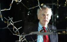 FILE: Dr James Watson with the original DNA model ahead of a press conference at the Science museum in London. Picture: AFP.