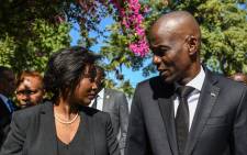 FILE: President of Haiti Jovenel Moise (R) arrives with the first lady Martine Moise (L) for the official ceremony of Haiti's 10th earthquake anniversary in Port-au-Prince, on 12 January 2020. Picture: CHANDAN KHANNA / AFP