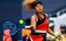 FILE: Japan’s Naomi Osaka returns a shot during the women’s single finals at the 2022 Miami Open presented by Itaú at Hard Rock Stadium in Miami Gardens, Florida, on 2 April 2022. Picture: CHANDAN KHANNA/AFP
