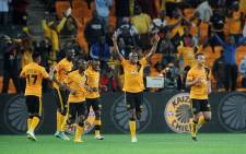 Kaizer Chiefs players celebrate with their fans after Matthew Rusike's second goal during their win against Polokwane City at the FNB Stadium on 22 April 2015. Chiefs won 4-1. Picture: PSL.